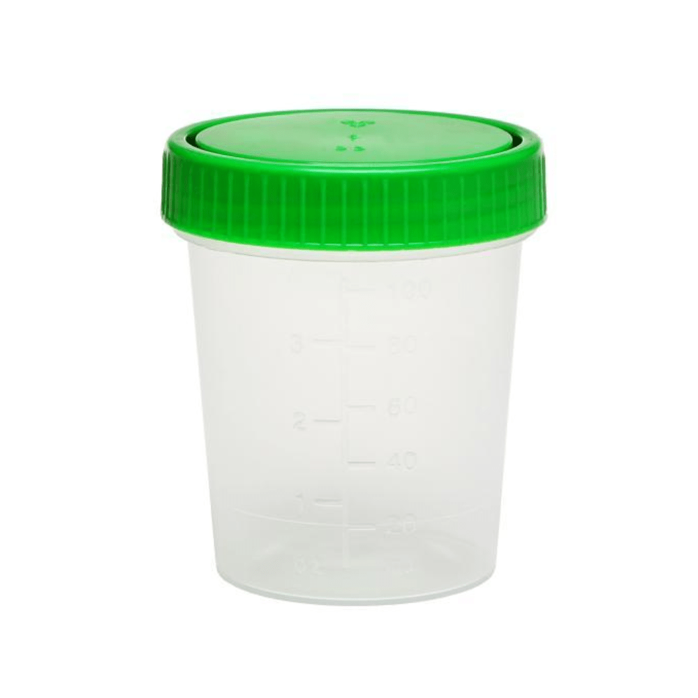The AMPri urine collection cup features a green screw-on lid and 100-ml measurement markings on its transparent polypropylene body; the tightly sealed lid stands out against a bright white background.