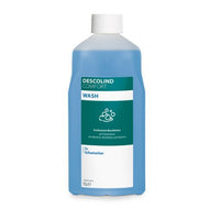 Die 1-Liter-Flasche Dr. Schumacher Waschlotion DESCOLIND COMFORT WASH der Dr. Schumacher GmbH mit weißer Kappe und blauer Flüssigkeit weist auf dem weiß-grünen Frontetikett neben den Produktangaben auf die pH-hautneutrale Formel und Allantoin hin.