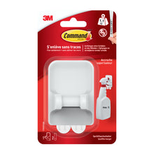 Der Command™ Sprühflaschenaufhänger 17009 von 3M Deutschland GmbH zeigt sich in einer rot-weißen Verpackung mit französischem Text, einer Sprühflaschenabbildung und wirbt für diesen platzsparenden Aufhänger mit Klebestreifen.