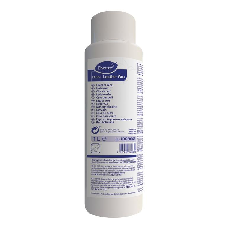 A white 1L bottle of TASKI Leather Wax from Diversey Deutschland GmbH & Co. OHG features a blue and purple label on the front with product information and instructions for effective leather care and natural shine in multiple languages.