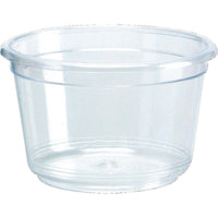 The Transparent PS 47x47x29 mm dressing cup from Duni GmbH is a clear container, ideal for sauces, condiments, or small food portions. Perfect for parties or events. Sold in packs of 50, ideal for the foodservice industry.