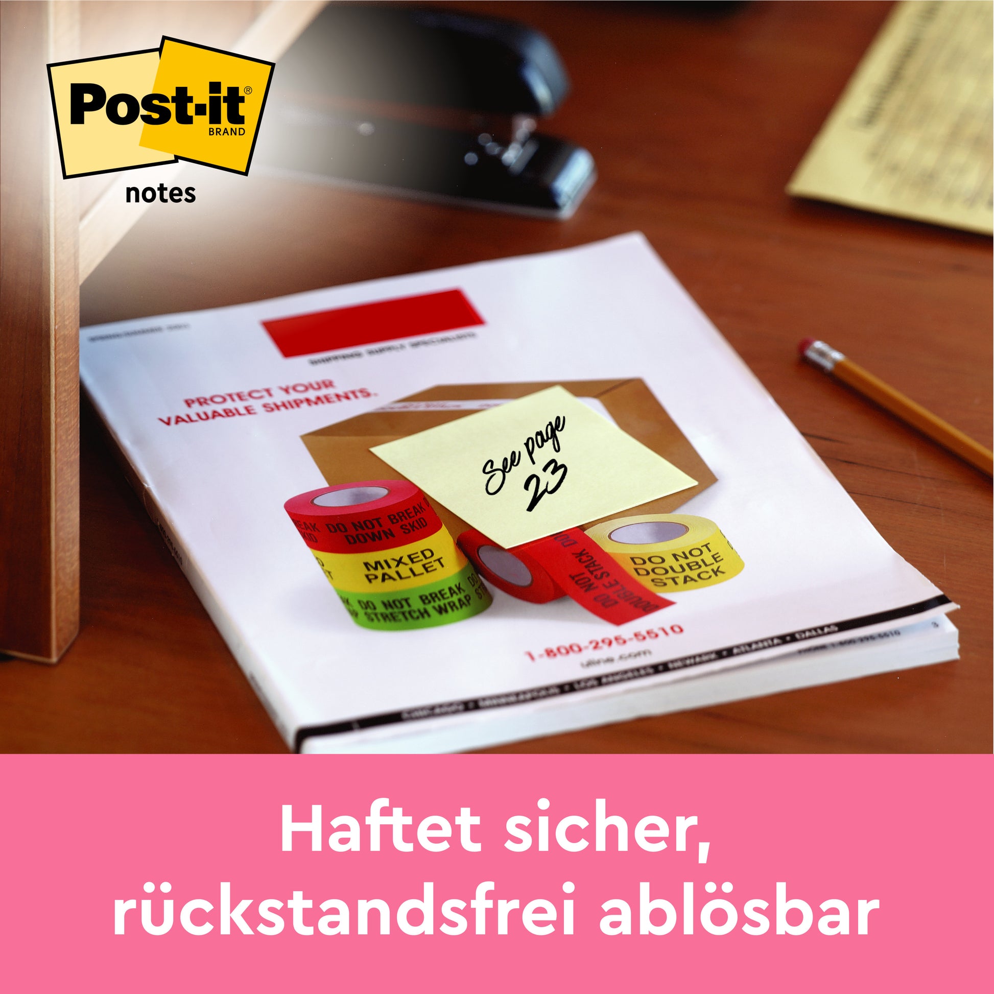 Ein gelber Post-it® Zettel (38 x 51 mm, 3M Deutschland GmbH) mit der Aufschrift "Siehe Seite 23" ist auf einem Schreibtischpapier befestigt. Im Hintergrund befinden sich Büromaterialien. Der deutsche Text lautet: "Haftet sicher, rückstandsfrei ablösbar.