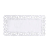 The PAPSTAR Square lace doilies, 40x20 cm, white (6 pieces) from PAPSTAR GmbH features a rectangular, white lace doily with a solid-color center and an intricate border, ideal for table decorations, pictured against a plain white background.