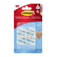 A package of Command™ Mini Hooks, clear, 17006CLR from 3M Deutschland GmbH contains 6 clear hooks and 8 clear strips. The blue-and-red package features information in French and English, making it perfect for leaving no marks when hanging items in your room.