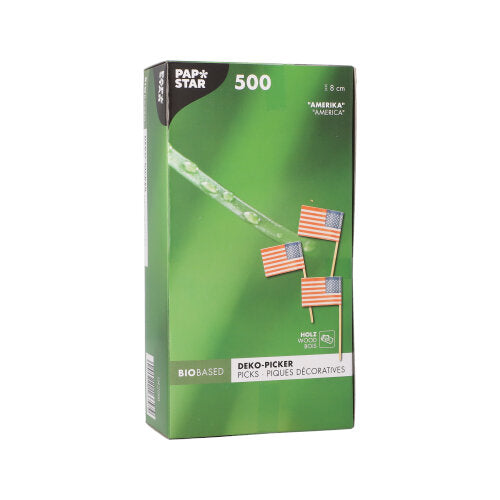A white box with the inscription "PAPSTAR 500 Deco-Picks 8 cm white" from PAPSTAR GmbH contains environmentally friendly picks for stylish presentations, with product information and a photo of the picks in several languages.
