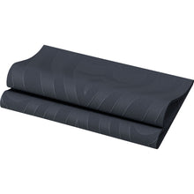 Eine gefaltete schwarze Yogamatte mit subtilen Wellenlinien vor weißem Hintergrund erinnert an die moderne Eleganz der Elegance Servietten 40x40 cm der Duni GmbH in Schwarz mit stilvollem Lilienmuster - ideal für schicke Tische.