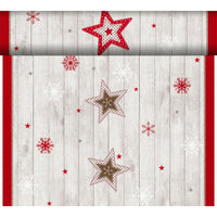 The Dunicel Tete a Tete 0.4x24m from Duni GmbH features red, white, and brown stars with snowflakes on a light wood-colored background with a red border—ideal as an elegant table runner for any festive table setting.