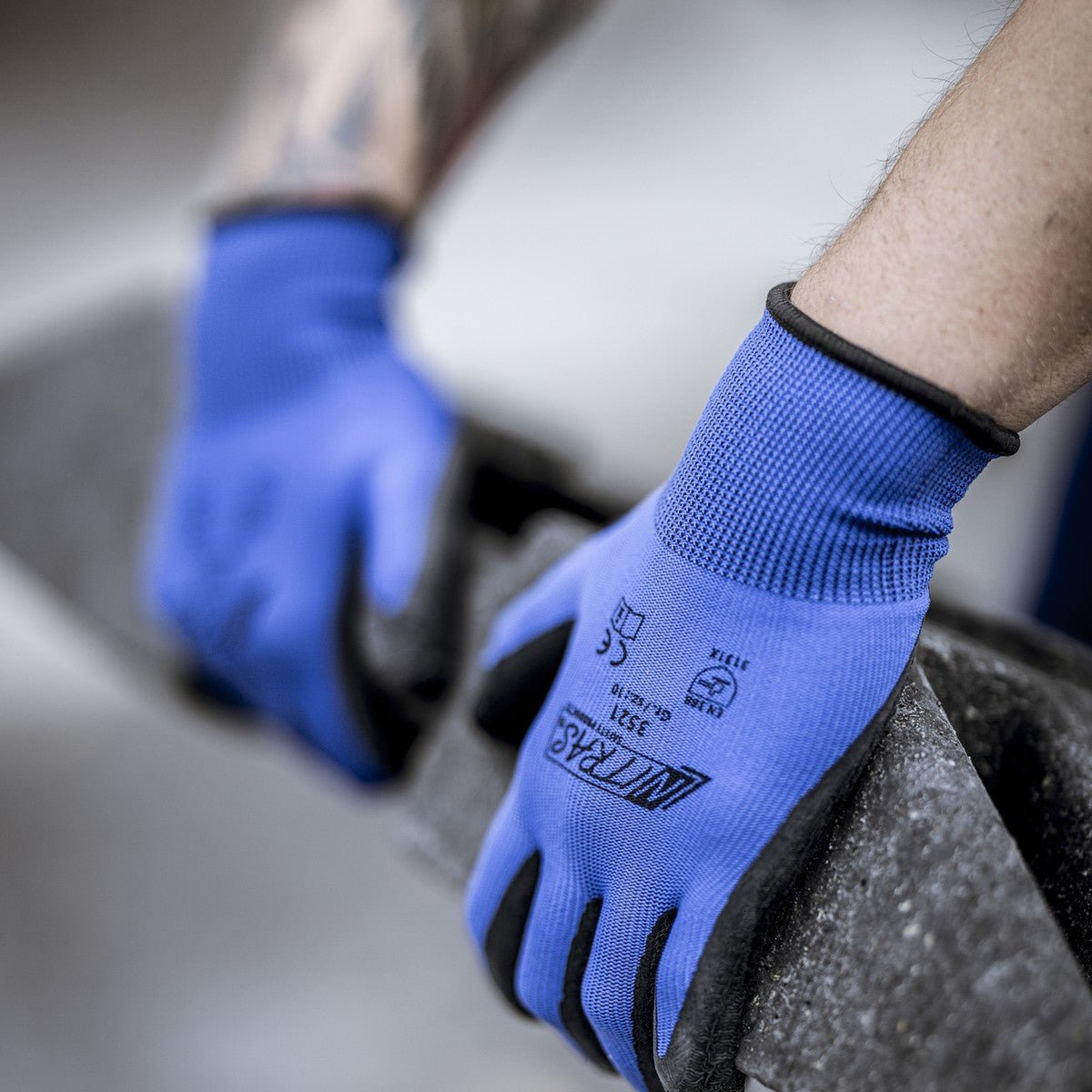 NITRAS Nylonhandschuhe, blau / schwarz