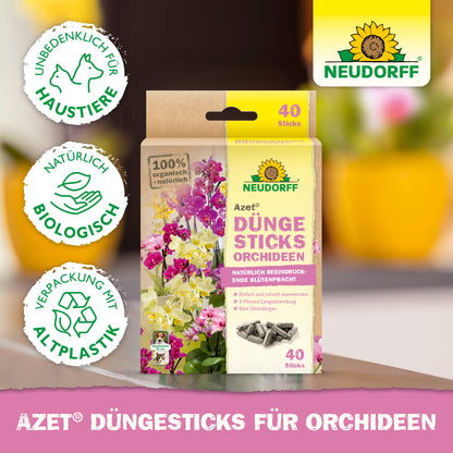 Eine Schachtel Neudorff Shop Azet Düngesticks für Orchideen ist mit 40 Sticks, Bio-Zertifizierungssymbolen, exotischen Blüten und blühenden Orchideen auf der Verpackung sowie umweltfreundlichen Symbolen abgebildet.
