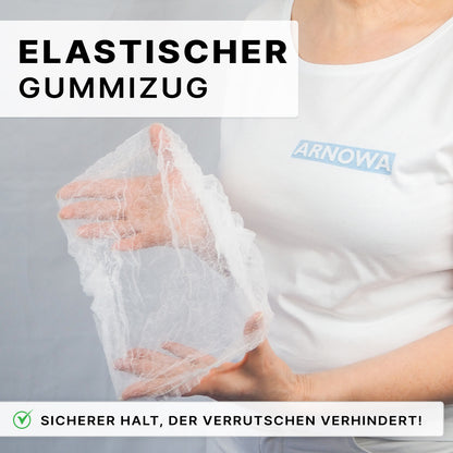 A person holds the ARNOMED COVER PP-CLIP CAP XL (55cm, PP fleece) from ARNOWA GmbH. The inscription: "Elastic band" and "Secure hold that prevents slipping!" - ideal for hygiene and disposable clip cap.
