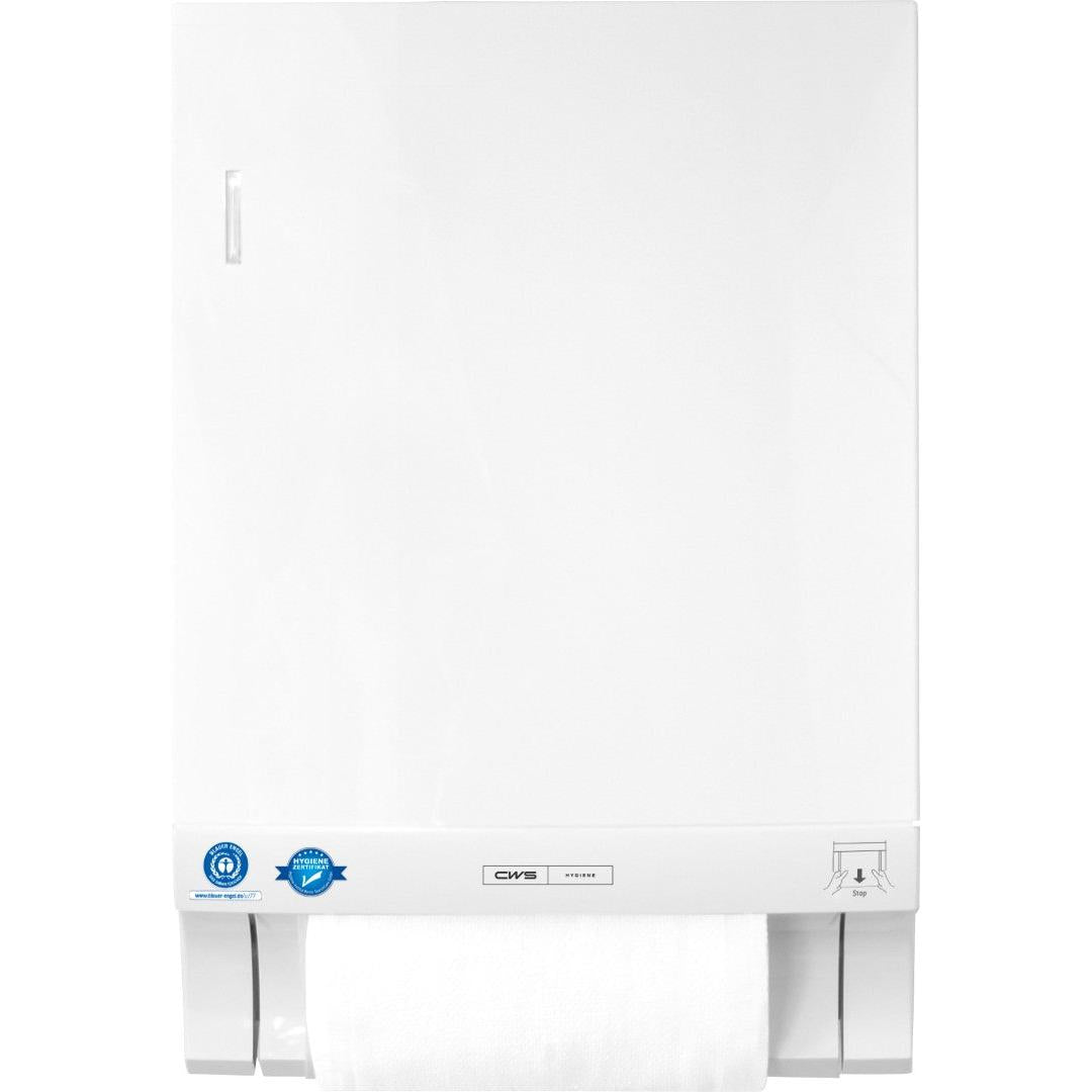 Un dispenser di asciugamani in tessuto CWS ParadiseLine Dry Slim bianco per montaggio a parete con una piastra, un rotolo di asciugamani parzialmente visibile nella parte inferiore e etichette sul bordo inferiore.