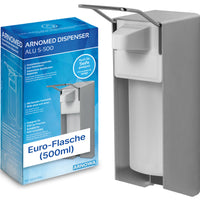 A gray ARNOMED DISPENSER—a manual soap and hand sanitizer dispenser made of aluminum by ARNOWA GmbH—is mounted on the wall next to its blue-and-white retail box; it is designed to hold 500-ml Euro bottles.