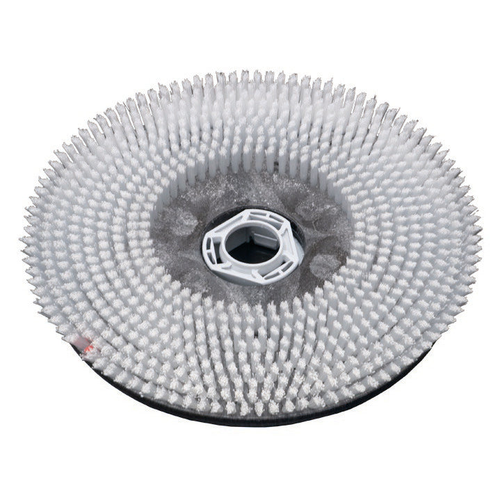 The Diversey Scrubbing Brush Nylon (43 cm) for swingo 1850 & 4000 has dense, white bristles in concentric circles with a plastic core. Pictured against a white background. 1 piece, standard scrubbing brush from Diversey Deutschland GmbH & Co. OHG.