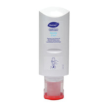 Eine weiße 300 ml Flasche Soft Care Gentle 2in1 Duschgel und Haarshampoo von Diversey Deutschland GmbH & Co. OHG, mit rotem Verschluss, ist auf dem Kopf stehend abgebildet. Das Frontetikett und der Hinweis auf die sanfte Formel sind sichtbar.