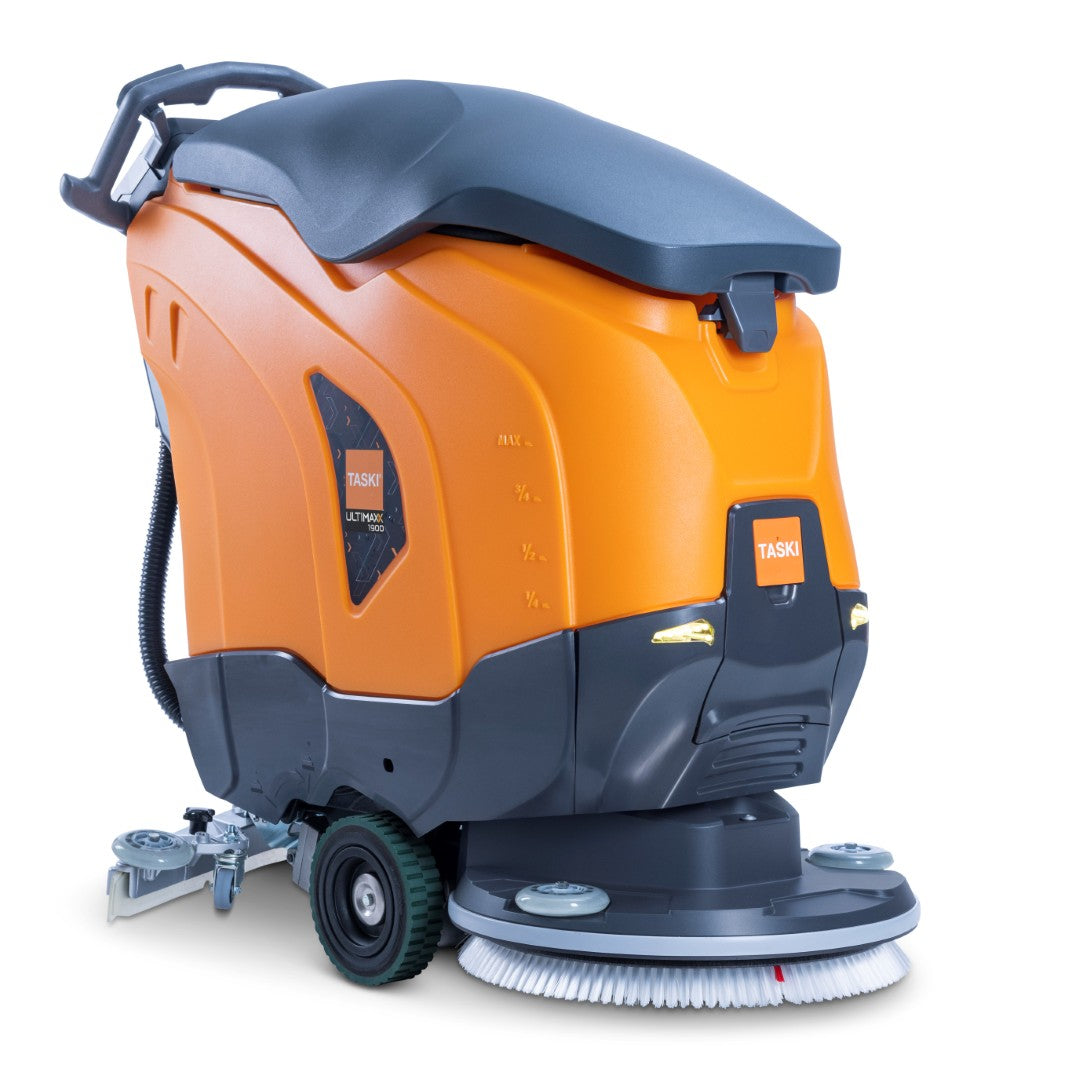 La machine à récurer TASKI ULTIMAXX 1900 SD50 Performance orange-noire de Diversey Deutschland GmbH & Co. OHG dispose d'une propulsion par roues, d'un réservoir de 42 litres et d'un disque unique de 50 cm ; le marquage est bien visible sur le boîtier.