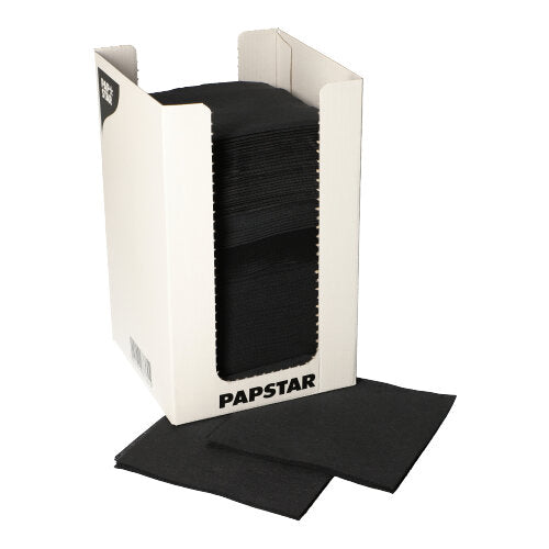 In a white box of PAPSTAR GmbH is a stack of black 2-ply 1/4-fold napkins "PUNTO" (20x20 cm, 100 pieces), with several napkins displayed at the front.