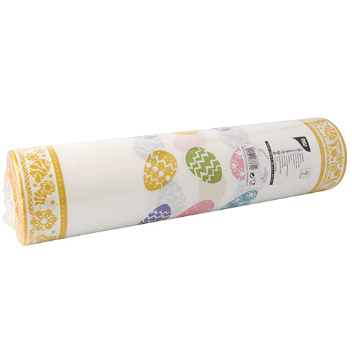 The PAPSTAR table runner, fabric-like Airlaid 24 m x 40 cm from PAPSTAR GmbH with pastel-colored Easter eggs and a yellow floral border - perfect as an elegant table decoration for festive occasions, with a barcode label on the packaging.
