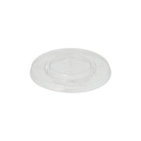 The PAPSTAR Round lid, Ø 9.5 cm, crystal clear, made of biodegradable PLA "pure" with a cross-slot opening measuring PAPSTAR The GmbH is round with a slightly raised center and comes in a pack of 100.