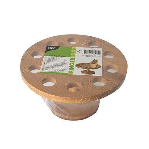 Un supporto per coni in bambù rotondo (Ø 18 cm) di PAPSTAR GmbH, con dieci fori, confezionato in plastica e con un'etichetta verde-bianca sulla parte superiore con idee per la presentazione dei coni e dettagliate informazioni sul prodotto.