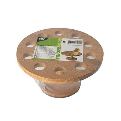Un supporto per coni in bambù rotondo (Ø 18 cm) di PAPSTAR GmbH, con dieci fori, confezionato in plastica e con un'etichetta verde-bianca sulla parte superiore con idee per la presentazione dei coni e dettagliate informazioni sul prodotto.