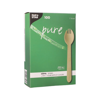 Una scatola verde della PAPSTAR GmbH con la scritta "pure" contiene 100 Göffel in legno ecologici (16 cm) in un vassoio di cartone, con marchio multilingue e informazioni sul prodotto, offrendo un'alternativa sostenibile agli utensili tradizionali.