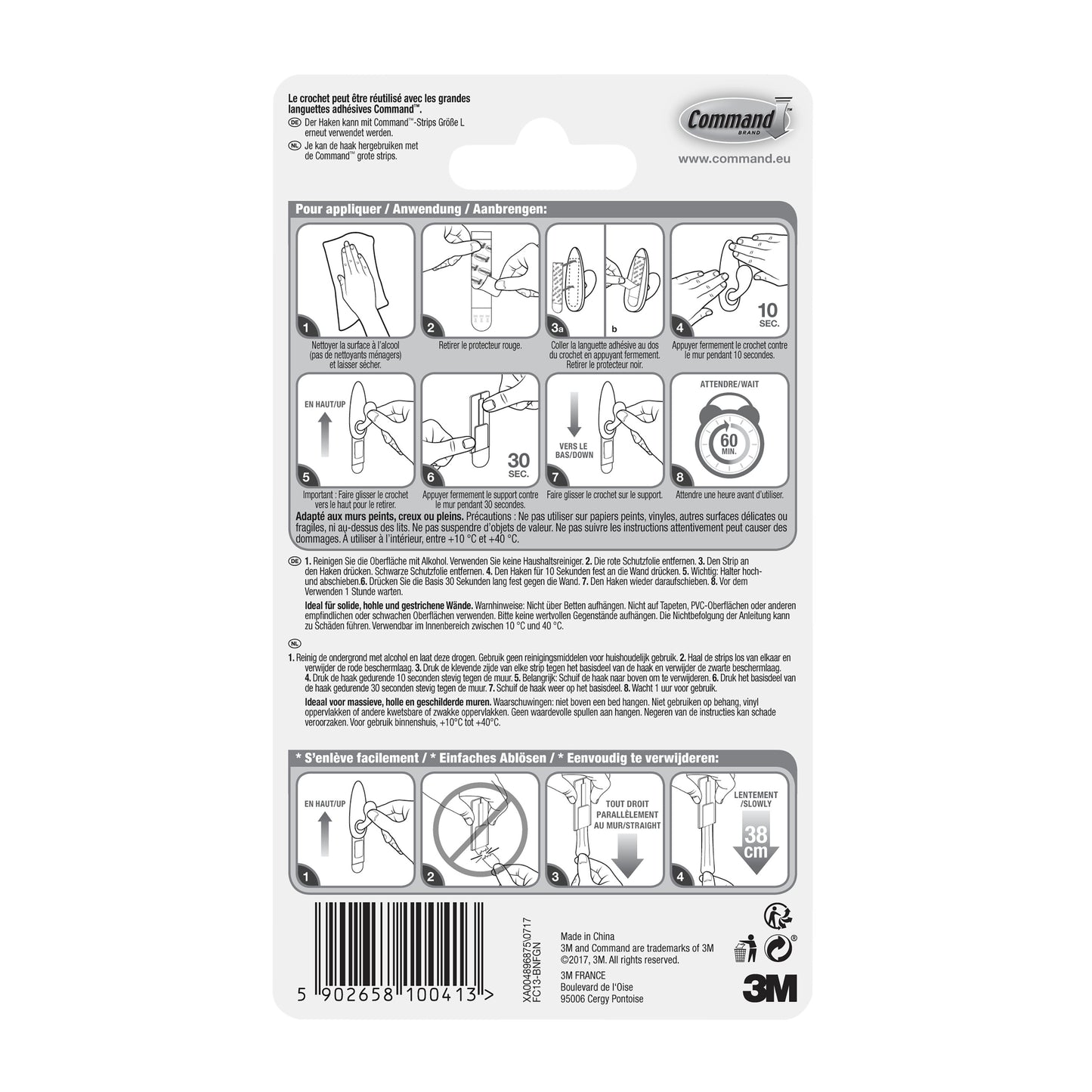 Rückseite der Command™ Metallhaken "klassisch" (3M Deutschland GmbH) Verpackung mit bebilderter Schritt-für-Schritt-Anleitung in mehreren Sprachen zur korrekten Anwendung und Entfernung sowie Warnhinweisen und Produktinformationen am unteren Rand.