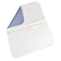The Abena Re-Seller GmbH Washable Pad (90x85 cm, light blue) is shown partially unfolded to reveal the quilted white top and the light blue waterproof bottom. The box contains 30 packs.