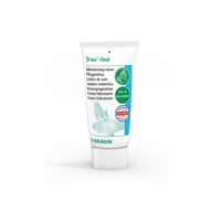 Tube of moisturizing B. Braun Trixo®-lind Skin Care Lotion with multilingual text. The packaging emphasizes that it is free of microplastics, contains coconut oil, and has a volume of 100 ml. In addition to brand and certification logos, a green hand symbol indicates that the product has a skin-neutral pH, courtesy of B. Braun Germany GmbH & Co. KG.