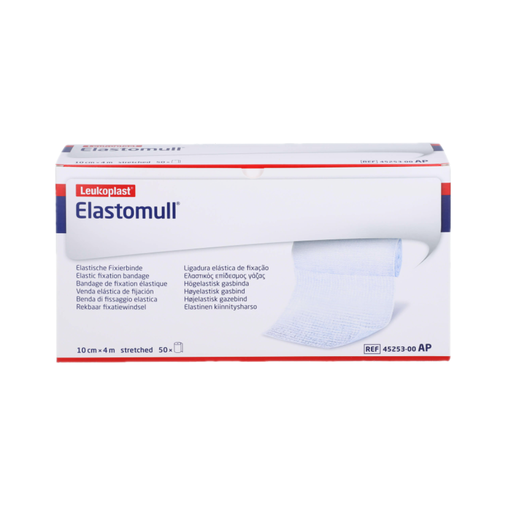 Präsentiert wird eine Schachtel mit der elastischen Fixierbinde BSN Elastomull® der BSN Medical GmbH, die für ihre gute Hautverträglichkeit bekannt ist. Die überwiegend weiße Verpackung mit roten und blauen Akzenten enthält mehrsprachigen Text, während die Binde – mit hohem Baumwollanteil – auf der Vorderseite teilweise entrollt ist.