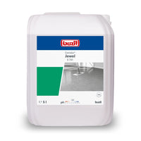 La photo représente un bidon de 5 litres contenant le nettoyant pour sols Buzil Corridor® Jewel S 741 « Hochleistungsdispersion » de la société BUZIL-WERK Wagner GmbH & Co. KG. L'étiquette comporte le logo de la marque, le nom du produit et l'image d'un sol brillant. Son pH est de 7,8 et il porte un symbole d'aptitude au PVC, ce qui le rend idéal pour le traitement des revêtements de sol.