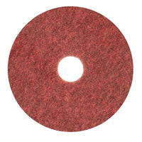 Il tampone abrasivo Diversey Twister Pad TXP per pavimenti in pietra, prodotto da Diversey Deutschland GmbH & Co. OHG, è un tampone rosso di forma circolare, dalla trama ruvida e con un foro centrale, ideale per la pulizia e la manutenzione dei pavimenti in pietra, raffigurato su sfondo bianco.
