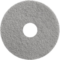 Le tampon Diversey Twister Pad gris de Diversey Deutschland GmbH & Co. OHG est rond, de couleur grise, doté d'une grande ouverture centrale et d'une surface texturée — idéal pour le polissage des sols durs revêtus. Vu de dessus sur fond blanc.