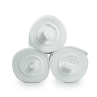 Three large white rolls of fabric—more specifically, Dr. Schumacher Decso Wipes RT, nonwoven cloth rolls—are stacked in a triangular formation against a plain white background. Each roll is tightly wound and reveals its hollow core in the center.