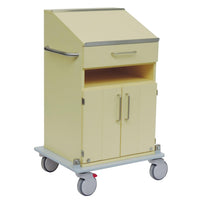 The Novocal ergonomic documentation cart features a yellow finish, a slanted worktop, a drawer, a shelf, two cabinet doors, four wheels (one with a red brake lever), a sturdy frame, and a metal handle on the side.