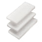 Drei rechteckige weiße SCHEUERVLIES-PADS (3er Set, weich, 260x120x25mm, F.#8616+17) von Haug Bürsten KG sind versetzt gestapelt. Die Pads haben eine raue Oberfläche und unebene Kanten - ideal für die Haushaltsreinigung.