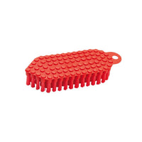 A red plastic Haug Bürsten FLEXO BRUSH, ø 0.35 mm, MEDIUM (190x70x25 mm), featuring a textured, rounded top, stiff bristles on the bottom, and a hanging hole at one end. Displayed against a plain white background.