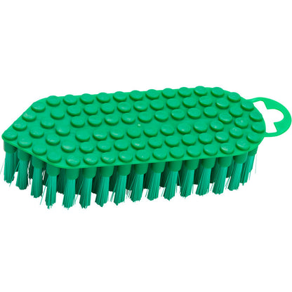 The Haug Bürsten KG FLEXO-BRUSH, PBT ø 0.35MM MEDIUM (190x70x25 mm) is a green cleaning brush with stiff PBT bristles, a textured top with raised circular elevations, and a small handle with an oval opening at one end.