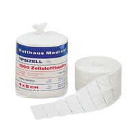 The image shows two rolls of medical gauze from Holthaus Medical GmbH & Co. KG. The roll on the left, labeled “Holthaus Ypsizell Cellulose Swabs, non-sterile 2 x 500 | Pack (1,000 pieces),” is packaged, while the roll on the right, with a partially unrolled strip, is unpackaged. The rolls are ideal for wound care and skin cleansing and each measure 4 cm by 5 cm.