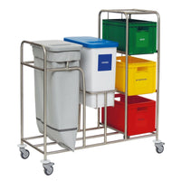 The Novocal Kombi Five-Compartment Recycling Bin is a stainless-steel recycling cart with wheels, four colored bins for glass, paper, plastic, and metal, and a gray side bag for general waste. Brand: Novocal.