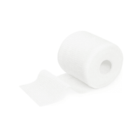 A single roll of white Meditrade ABE® Last® fixation bandage with a few sheets unrolled, isolated against a white background.
