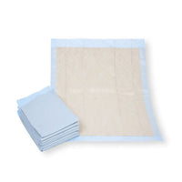 Accanto a un telo aperto è visibile una pila di teli protettivi per letto Meditrade da 60 x 90 cm, realizzati in cellulosa riciclata ecocompatibile. Con il loro design rettangolare, caratterizzato da un bordo blu e da una parte centrale beige, questi teli della Meditrade GmbH garantiscono igiene e protezione.