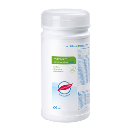 White cylindrical container with "Schülke Mikrozid® sensitive wipes jumbo" for surface cleaning and disinfection, labeled as alcohol-free disinfectant wipes with detailed information and branding of Schülke & Mayr GmbH.