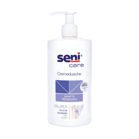 La Seni La crema doccia Care di TZMO Deutschland GmbH, da 500 ml, contiene il 3% di urea, silimarina e una formula vegana. Il flacone bianco è dotato di un erogatore a pompa e reca la scritta blu «DETERGENZA DELICATA», ideale per la pelle secca.