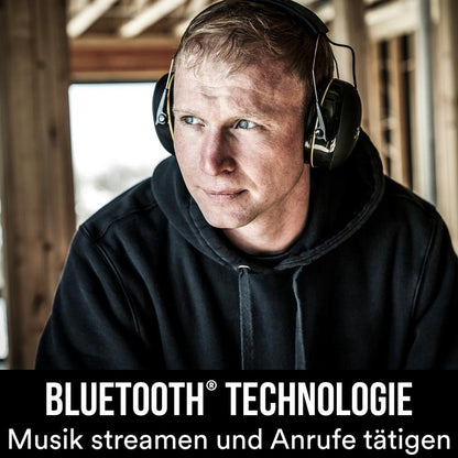 A man wears a black hoodie indoors and the 3M™ WorkTunes™ Connect Hearing Protector 90543E (SNR 31 dB) from 3M Deutschland GmbH. Text: "Bluetooth Hearing Protection. Stream music and make calls.