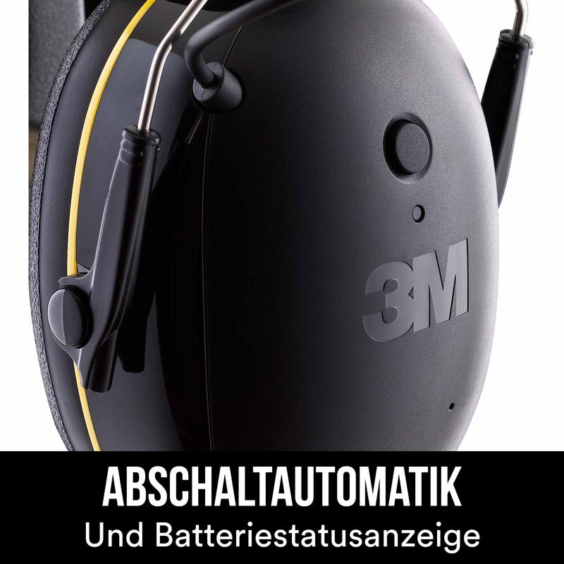 Side close-up of the black 3M™ WorkTunes™ Connect Hearing Protector 90543E (SNR 31 dB) with yellow stripe. Text: "AUTO SHUT-OFF and Battery Status Display" - automatic shut-off and battery status display.