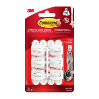 Der Command™ Mini-Haken, 17006 von 3M Deutschland GmbH enthält sechs weiße Haken mit Klebestreifen zum beschädigungsfreien, bohrfreien Aufhängen. Rückstandsfrei entfernbar; geliefert in rot-weißer Verpackung.
