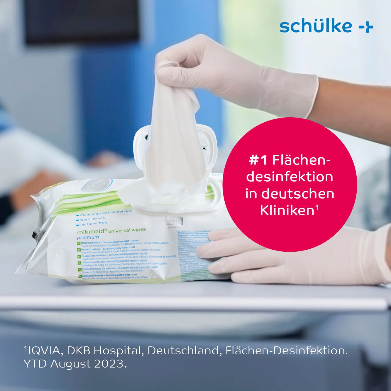 A person with white medical gloves pulls a Schülke Mikrozid® universal wipes premium disinfection wipe from a container on a table. The text on the image includes "#1 surface disinfection in German clinics" and information about IQVIA and the DKB hospital in Germany.